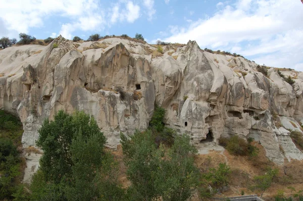 stock image Valley of Goreme, in Cappadocia (Central Anatolia, Turkey). Ancient rock-cut Christian Byzantine churches. Fairy Chimneys