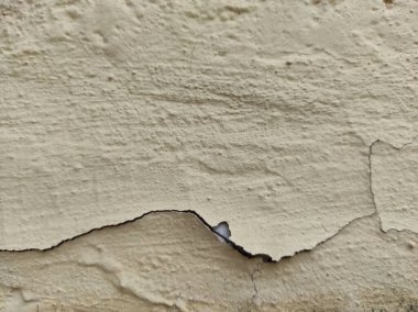 Doku. Duvar kağıdı. Eski, pürüzlü, sararmış bir duvar. Eski