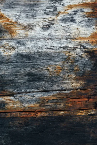 Mavi ve turuncu renkli eski paslı ahşap panel