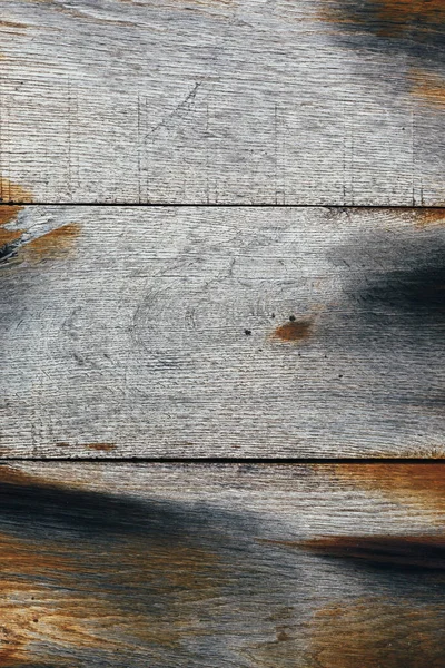 Mavi ve turuncu renkli eski paslı ahşap panel