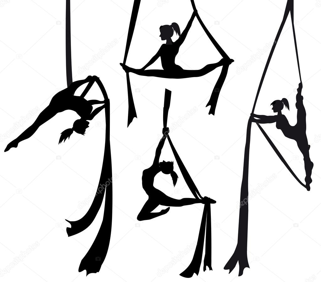 Aerial silk dancer in silhouette