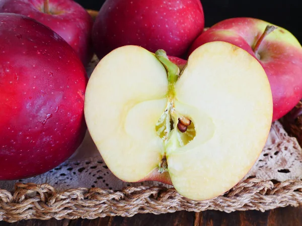 Red apple, fruit close-up, cut in half, apple core