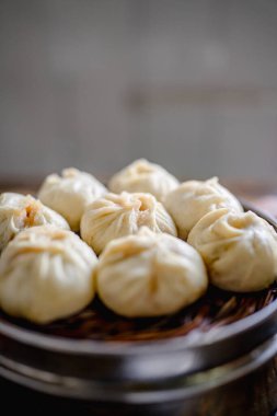 Asya kahvaltısı nefis, domuz eti ve sebzeli çörekler, buğulanmış çörekler, pişirilmiş