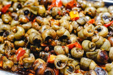 Kızarmış salyangozlar, mutfak atıştırmalıkları.