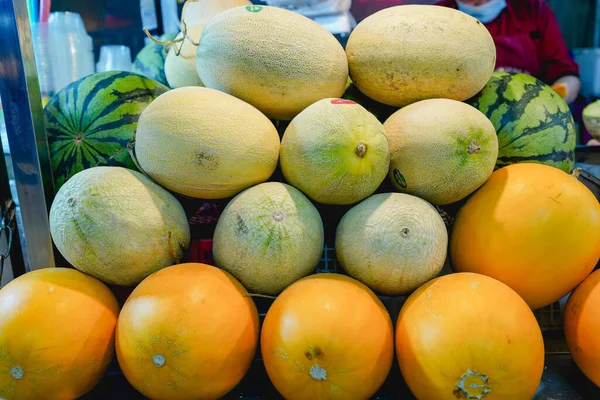 Summer fruit stand cantaloupe watermelon