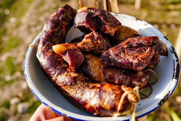 Horse meat and sausage cooked on the prairie