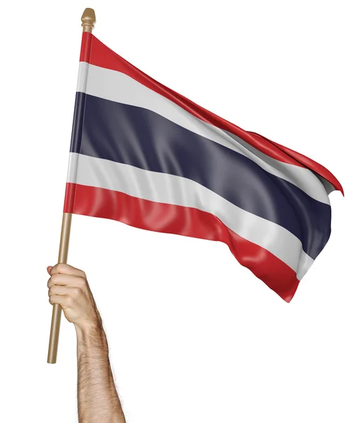Mano orgullosamente ondeando la bandera nacional de Tailandia —  Fotos de Stock