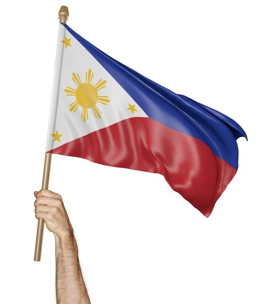 Ruka hrdě mává státní vlajka Filipíny — Stock fotografie