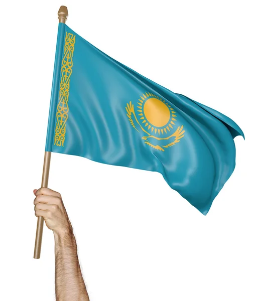 Hand stolt viftar den nationella flaggan i Kazakstan — Stockfoto