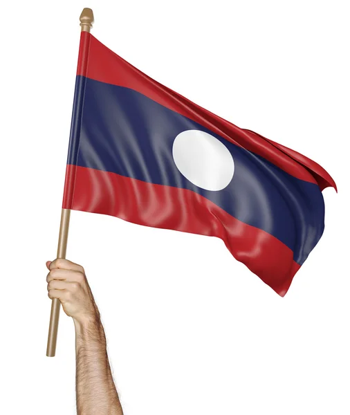 Hand stolz die Nationalflagge von Laos schwenkend — Stockfoto