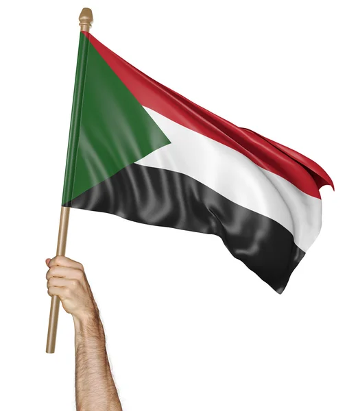 Mão orgulhosamente acenando a bandeira nacional do Sudão, renderização 3D — Fotografia de Stock
