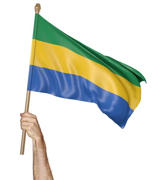 Mão orgulhosamente acenando a bandeira nacional do Gabão, renderização 3D — Fotografia de Stock