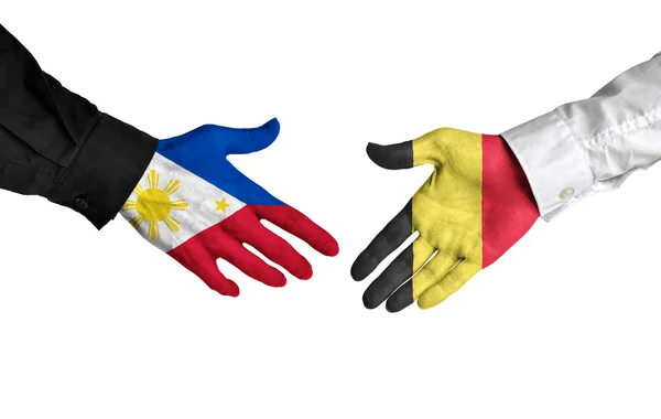 Filippinerna och Belgien ledare skakar hand på en del avtal — Stockfoto