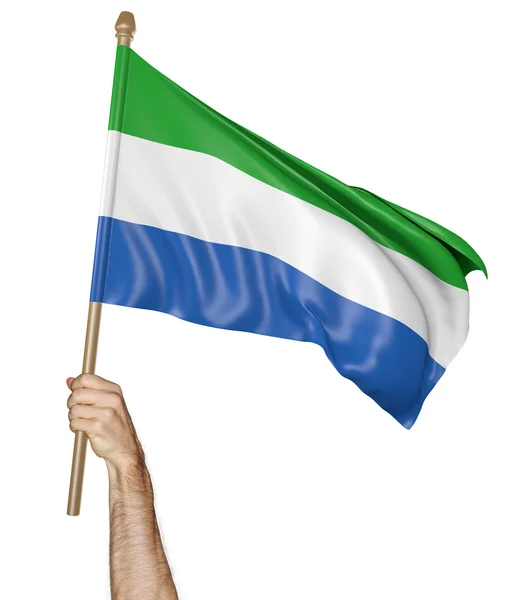 Mão orgulhosamente acenando a bandeira nacional da Serra Leoa, renderização 3D — Fotografia de Stock