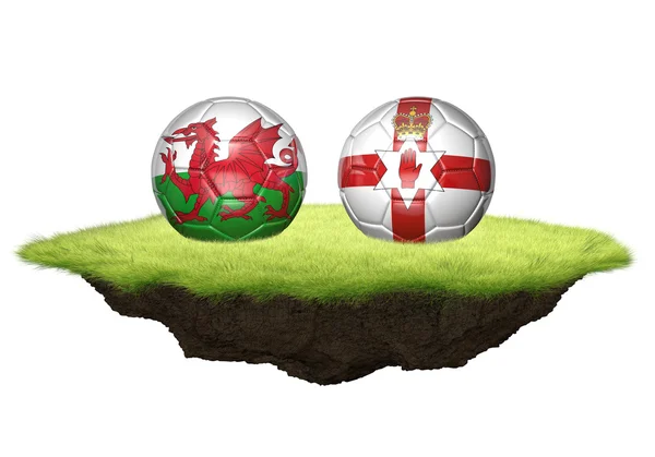 Wales vs Irlanda del Norte bolas de equipo para el torneo de campeonato de fútbol, representación 3D — Foto de Stock
