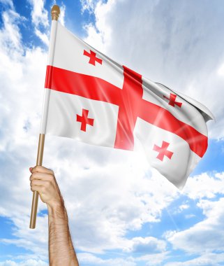 Gürcü bayrağı tutarak ve gökyüzü, 3d render sallayarak birinin elini