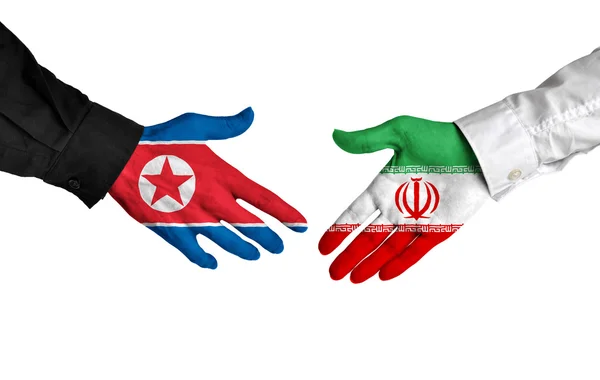 北朝鮮とイランのリーダーの契約契約に握手 — ストック写真