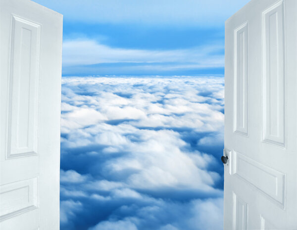 Doors opening to a heavenly sight of fluffy clouds