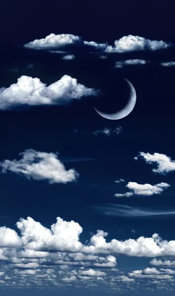 Surreal clouds in night sky with crescent moon — Stock Photo, Image