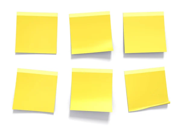 Conjunto de notas amarelas pegajosas usadas em um escritório para lembretes e informações importantes — Fotografia de Stock