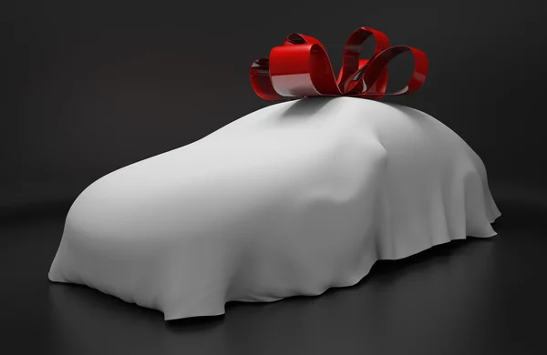 贈り物として赤いリボンをのせた新しい覆われたスポーツカーの自動車の概念 — ストック写真