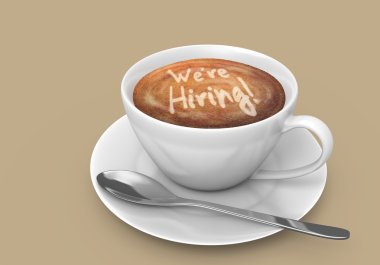 Latte art message in a coffee cup that says we are hiring clipart