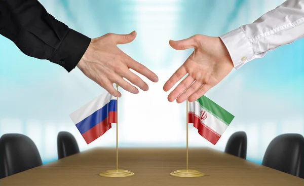 Russia and Iran diplomats agreeing on a deal — Stock Photo, Image