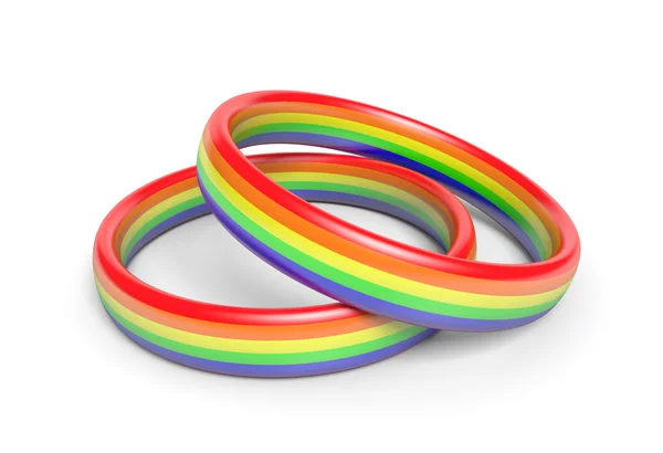 Due fedi nuziali con i colori della bandiera arcobaleno, simbolo di coppie gay o dello stesso sesso — Foto Stock