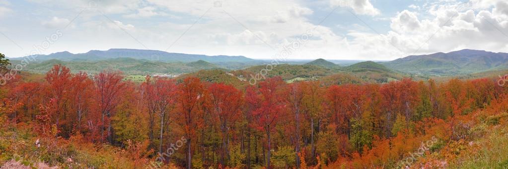 Wide panorama of the Appalachian Mountains with bright red autumn leaf colors