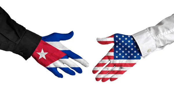 Cuban and American leaders shaking hands on a deal agreement — Stock Photo, Image