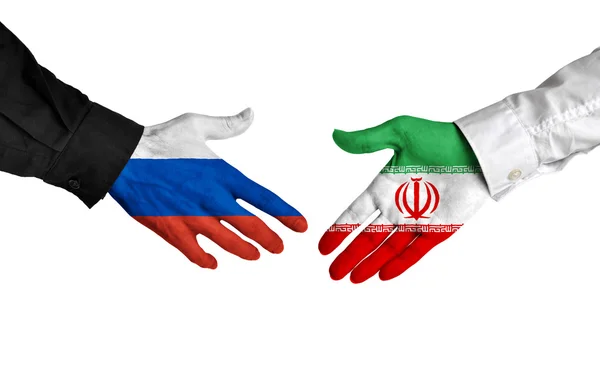 Russian and Iranian leaders shaking hands on a deal agreement — Stock Photo, Image