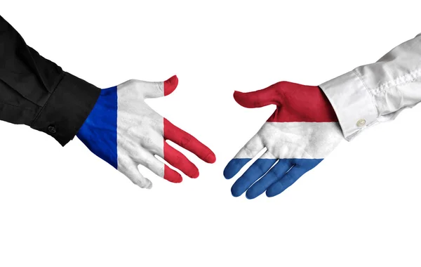 Франції і Нідерландах лідерів, потискує руку угода угода — стокове фото