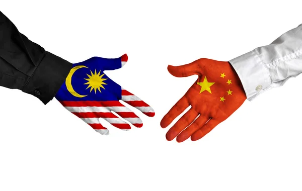 Malesia e Cina stringono la mano a un accordo — Foto Stock