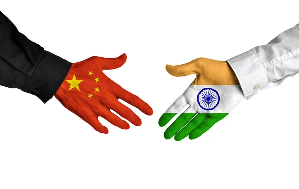 China and India leaders shaking hands on a deal agreement — Stock Photo, Image