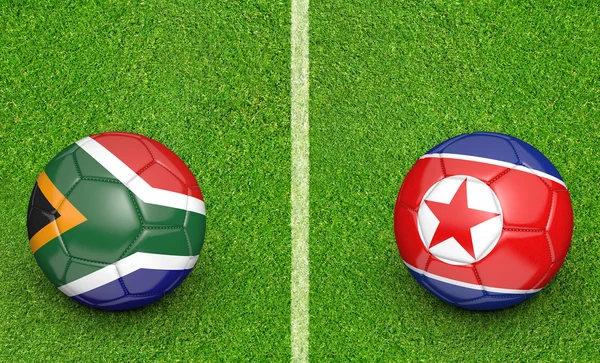Güney Afrika vs Kuzey Kore Futbol turnuvası için takım topu maç — Stok fotoğraf