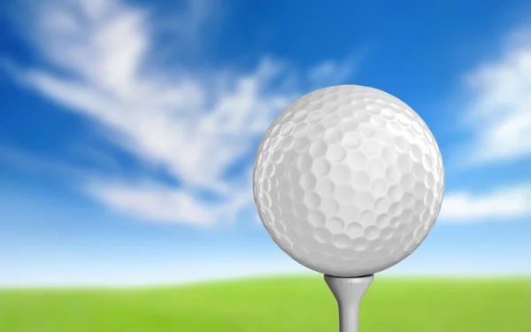 Gewone witte golfbal, zittend op een tee — Stockfoto