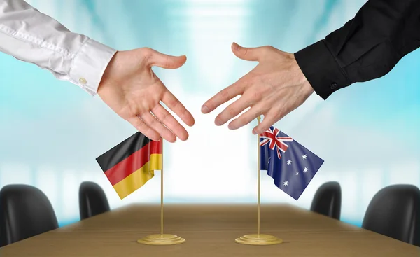 Germany and Australia diplomats agreeing on a deal — Stock Photo, Image