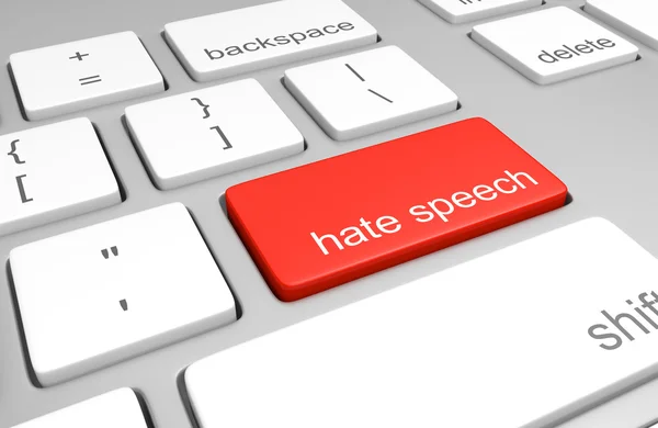 Tecla de discurso de ódio em um teclado de computador representando comentários difamatórios on-line — Fotografia de Stock