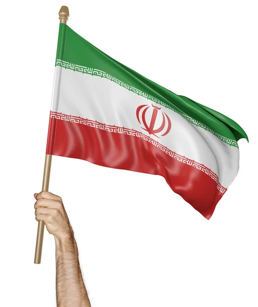 Рука гордо машет национальным флагом Ирана — стоковое фото