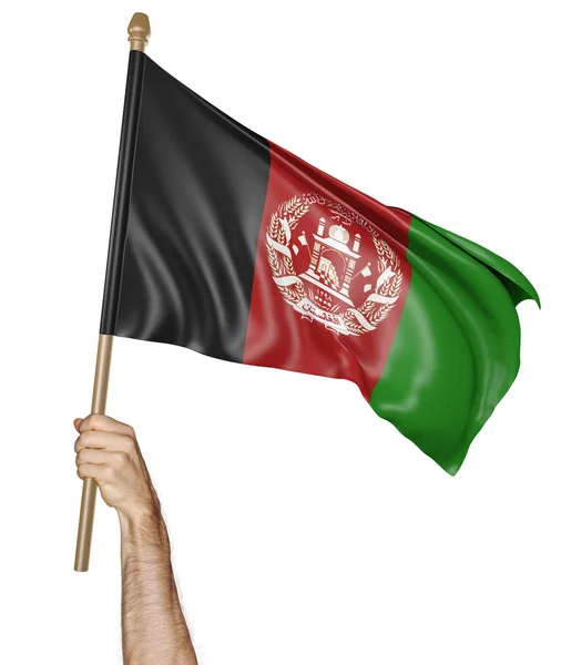 Hand stolt viftar den nationella flaggan i Afghanistan — Stockfoto