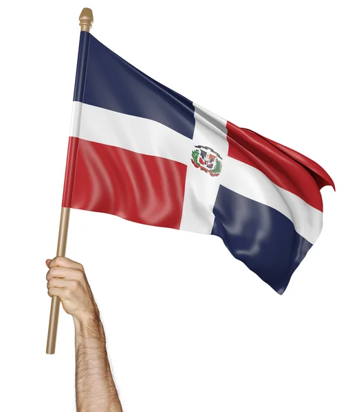 Mano orgullosamente ondeando la bandera nacional de la República Dominicana — Foto de Stock