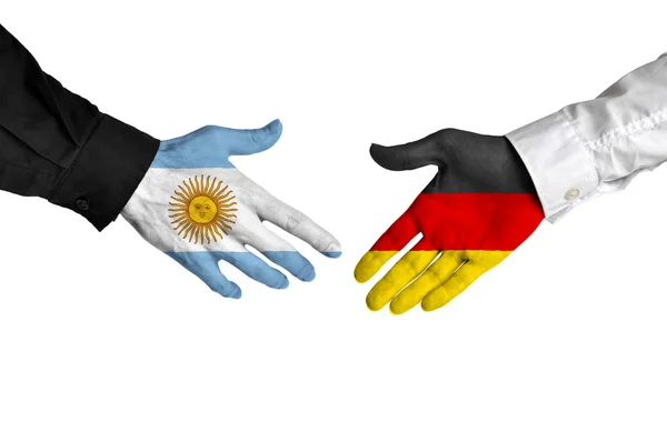 Argentinië en Duitsland leiders handen schudden op een deal overeenkomst — Stockfoto