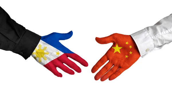 Filipíny a čínští představitelé potřesení rukou na obchod dohodu — Stock fotografie