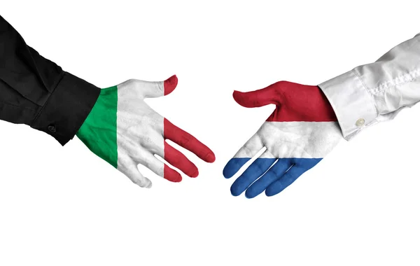 イタリアとオランダの指導者の契約契約に握手 — ストック写真
