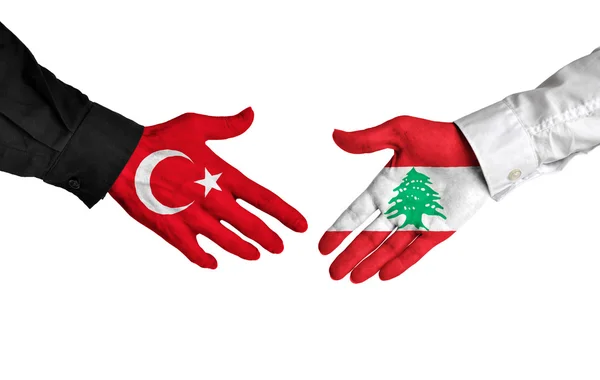Bir anlaşma üzerinde anlaşmaya tokalaşırken Türkiye ve Lübnan liderleri — Stok fotoğraf