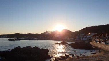 Gün batımında Gijang Sahili