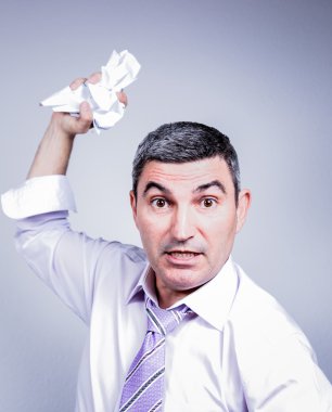 Angry businessman,bankrupt, business, businessman, computer, confused, contemporary, crazy, crisis, depressed, despair, desperate, determination,displeased,distraught,distressed,astonished,bad,banker,