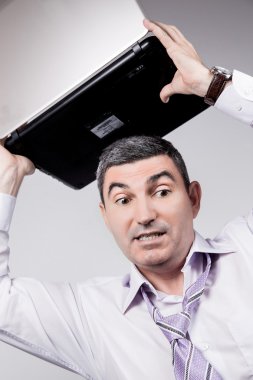 Angry businessman,adult, afraid, aggressive, anger, anxiety, astonished, astonishment, bad, banker, bankrupt, business, businessman, computer, confused, contemporary, crazy, crisis,