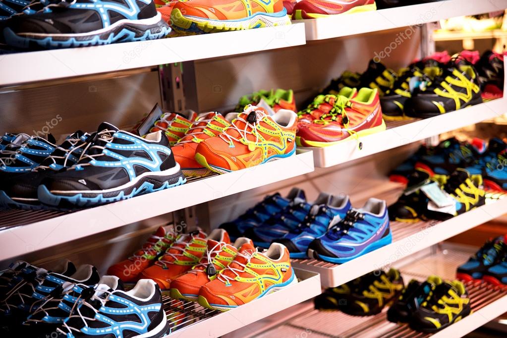 Shelves with sport shoes, sport store 