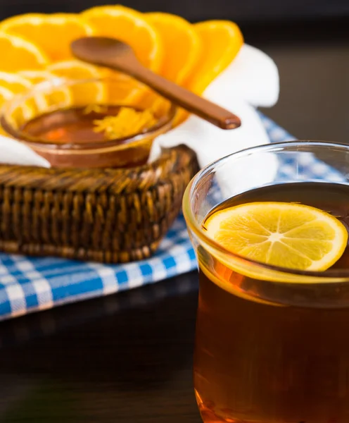 Cup of tea and citruses — Stock Photo, Image